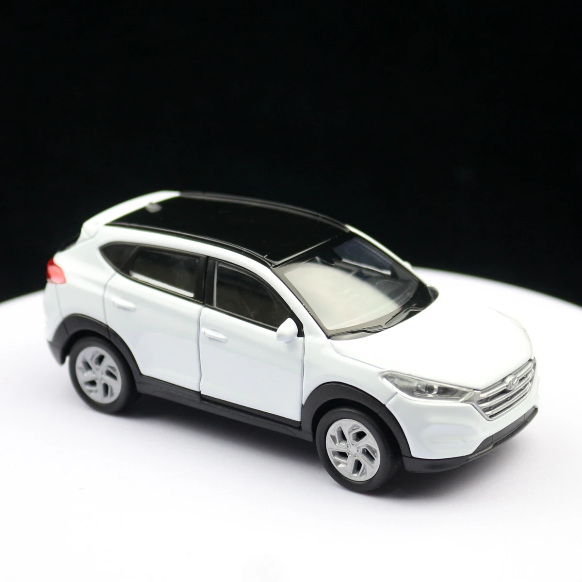 Welly Hyundai Tucson SUV Escala 1:36 — imagen 5